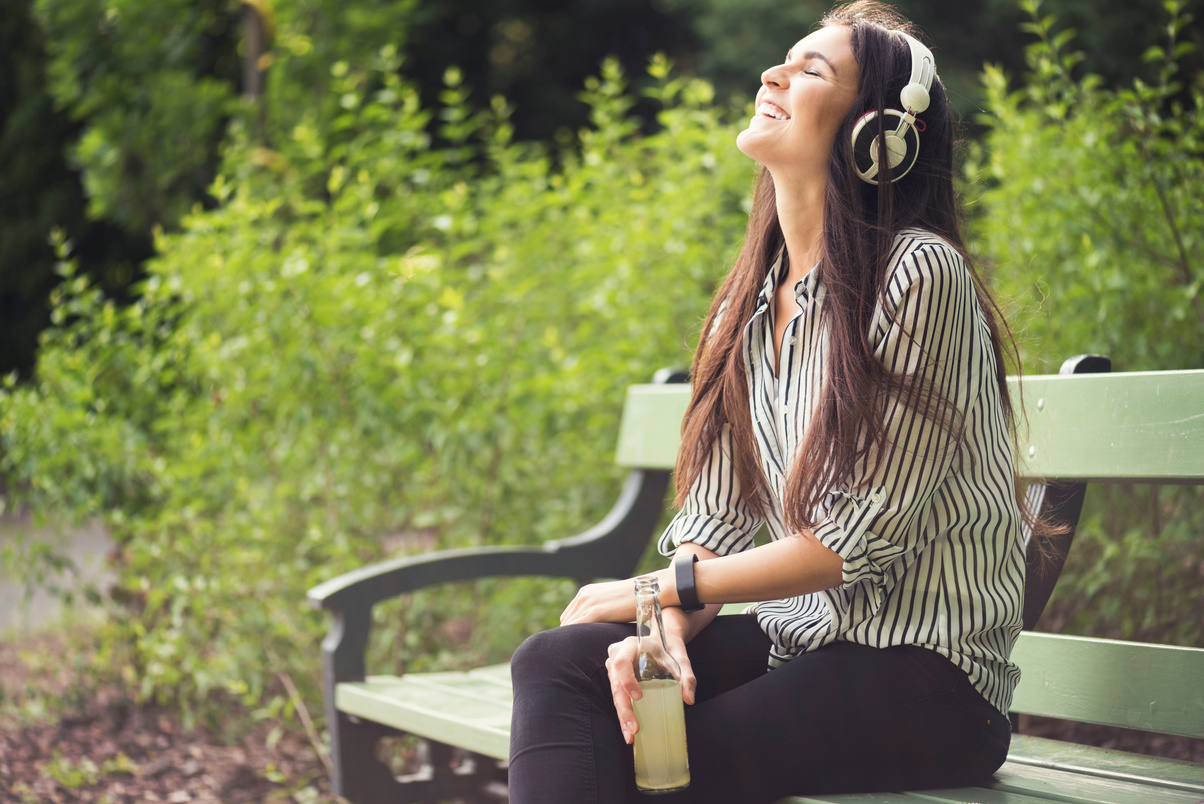 Woman listening to a podcast